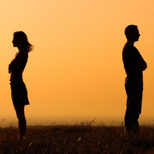 Angry couple silhouette in field - Law Offices Of David Bliven